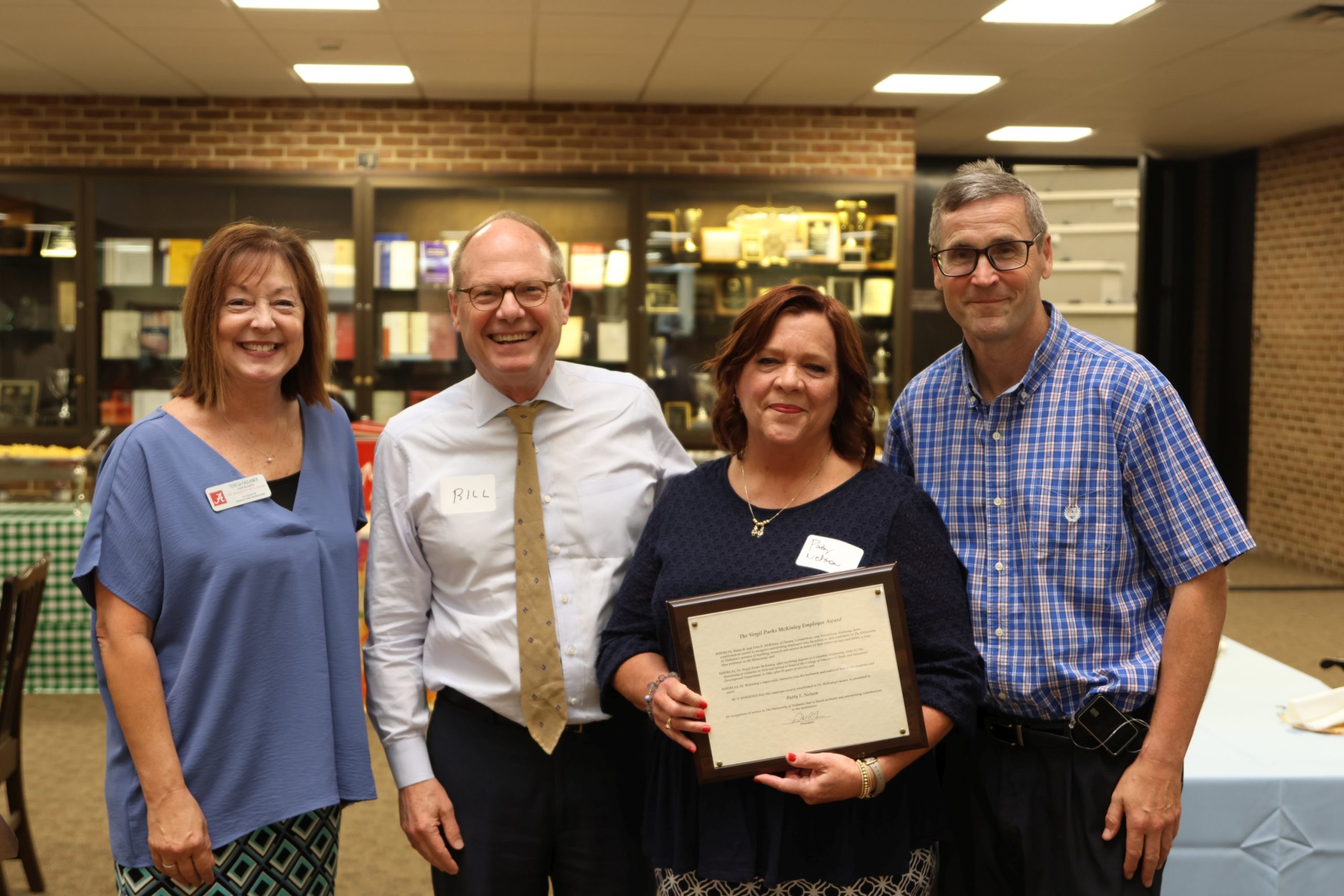 Teresa Faulkner, Dean Bill Brewbaker, Patty Nelson, and Dan Powell