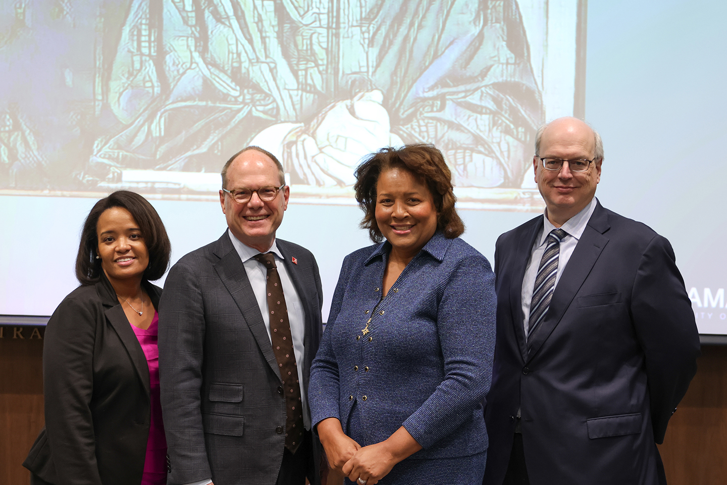 Prof. Daquiri Steele, Dean Bill Brewbaker, Judge J. Michelle Childs, and Prof. Ron Krotoszynski pose at the Judge Frank M. Johnson, Jr. Memorial Lecture on November 22, 2024. 