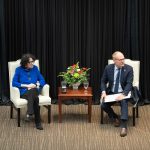 Justice Sonia Sotomayor sits in a chair with Dean Bill Brewbaker, also in a chair. They are not looking at the camera and Dean Brewbaker appears mid-sentence.