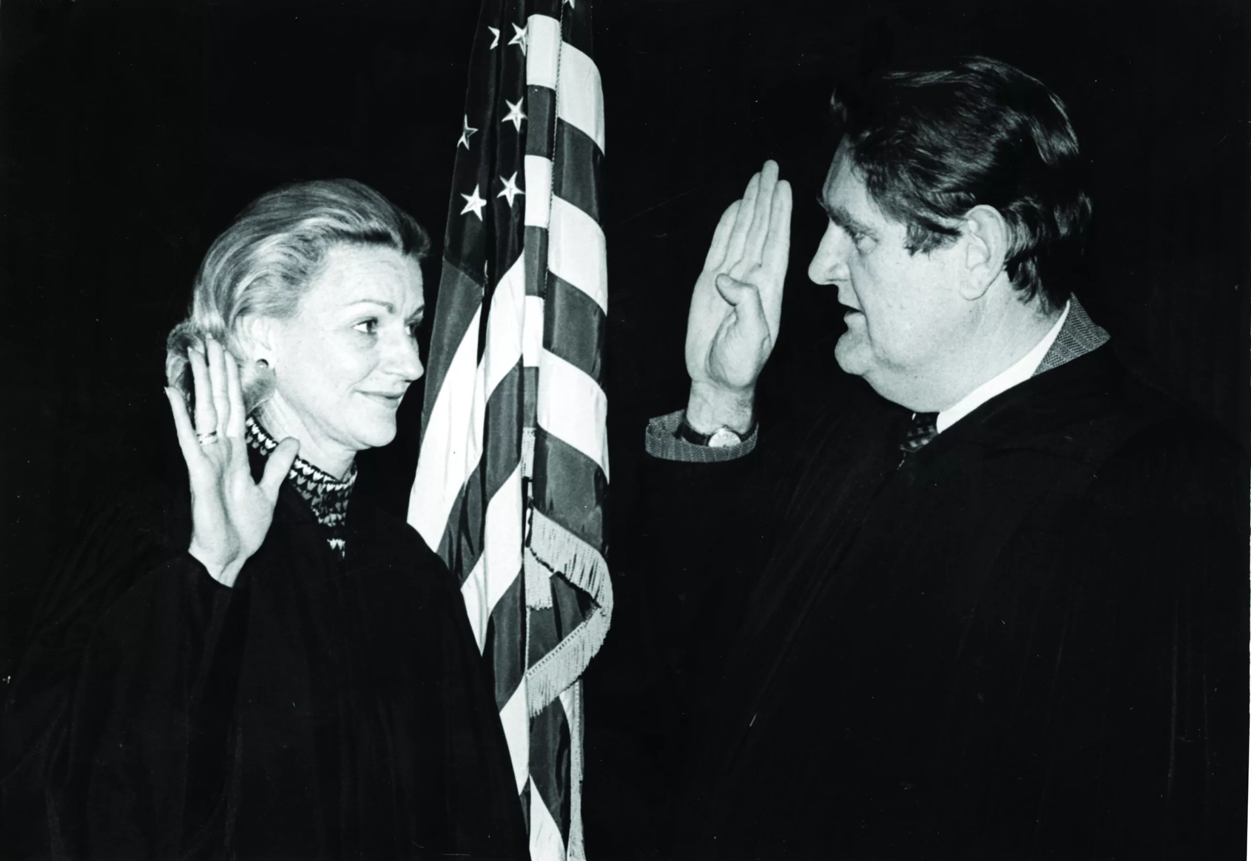 Former Chief Justice Howell Heflin (Class of 1948) swears Justice Janie Ledlow Shores (Class of 1959) into the Alabama Supreme Court in January 1975.