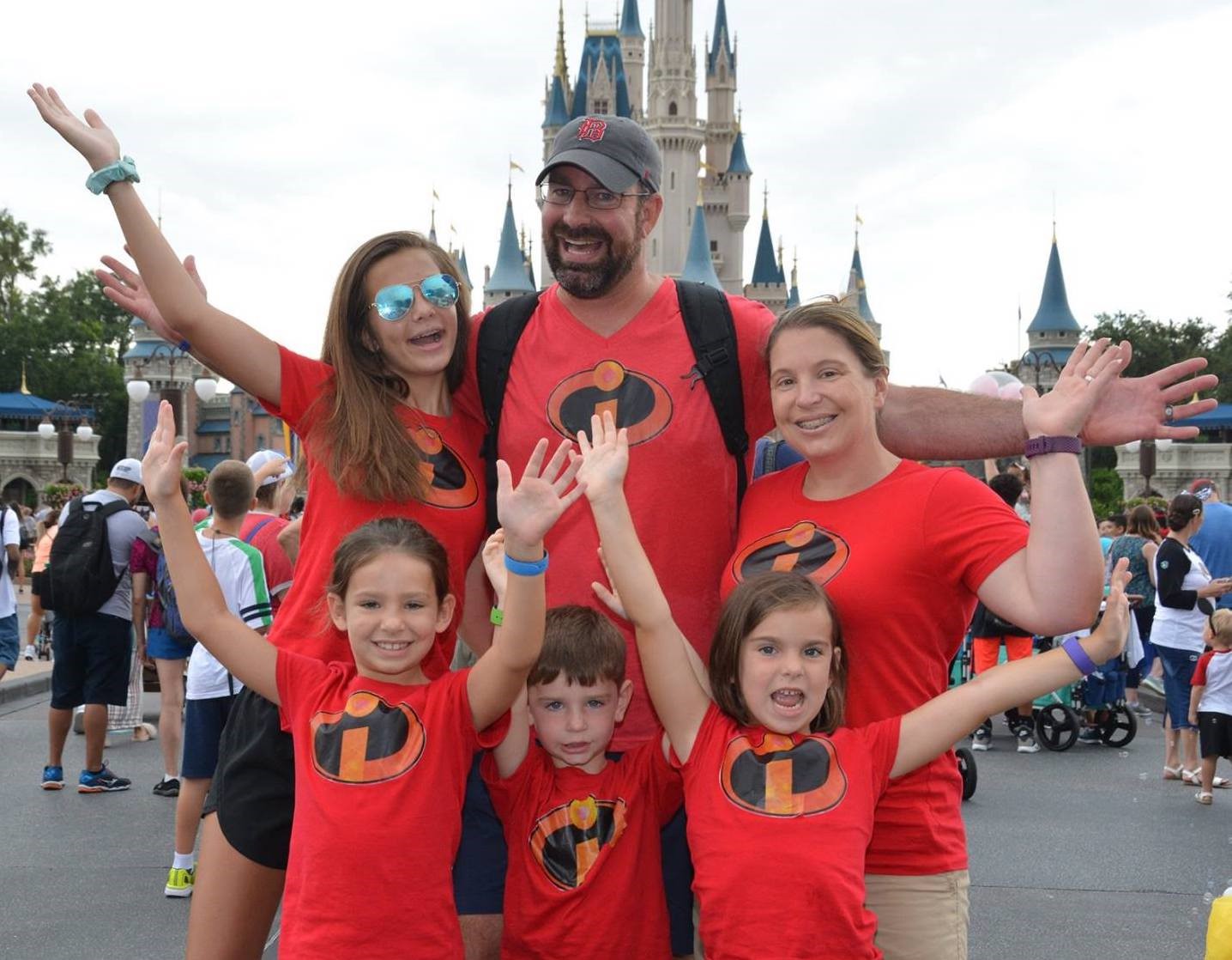 Scott, Beth, and their four children in Magic Kingdom