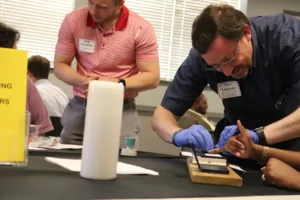 Yui Linetski fingerprinting at the expungement clinic co-hosted by The University of Alabama School of Law