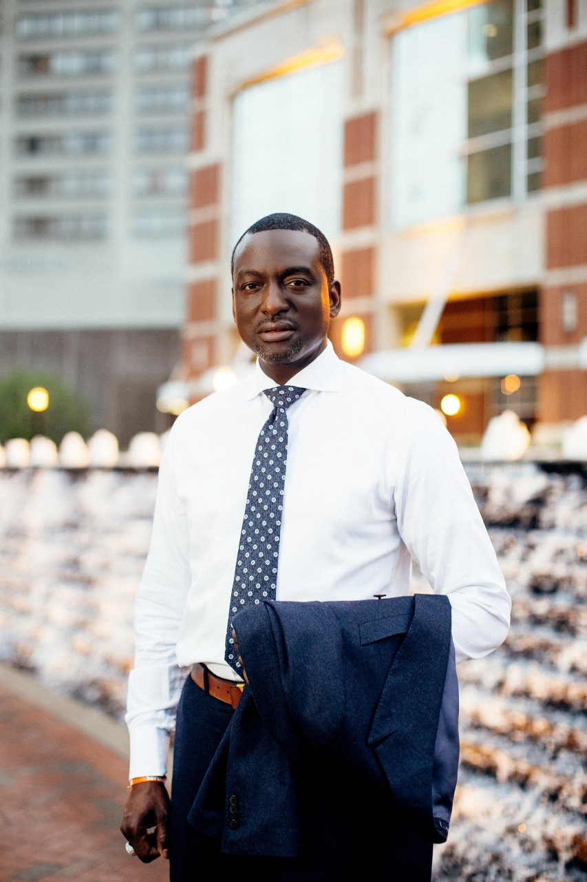 Yusef Salaam standing in front of a building